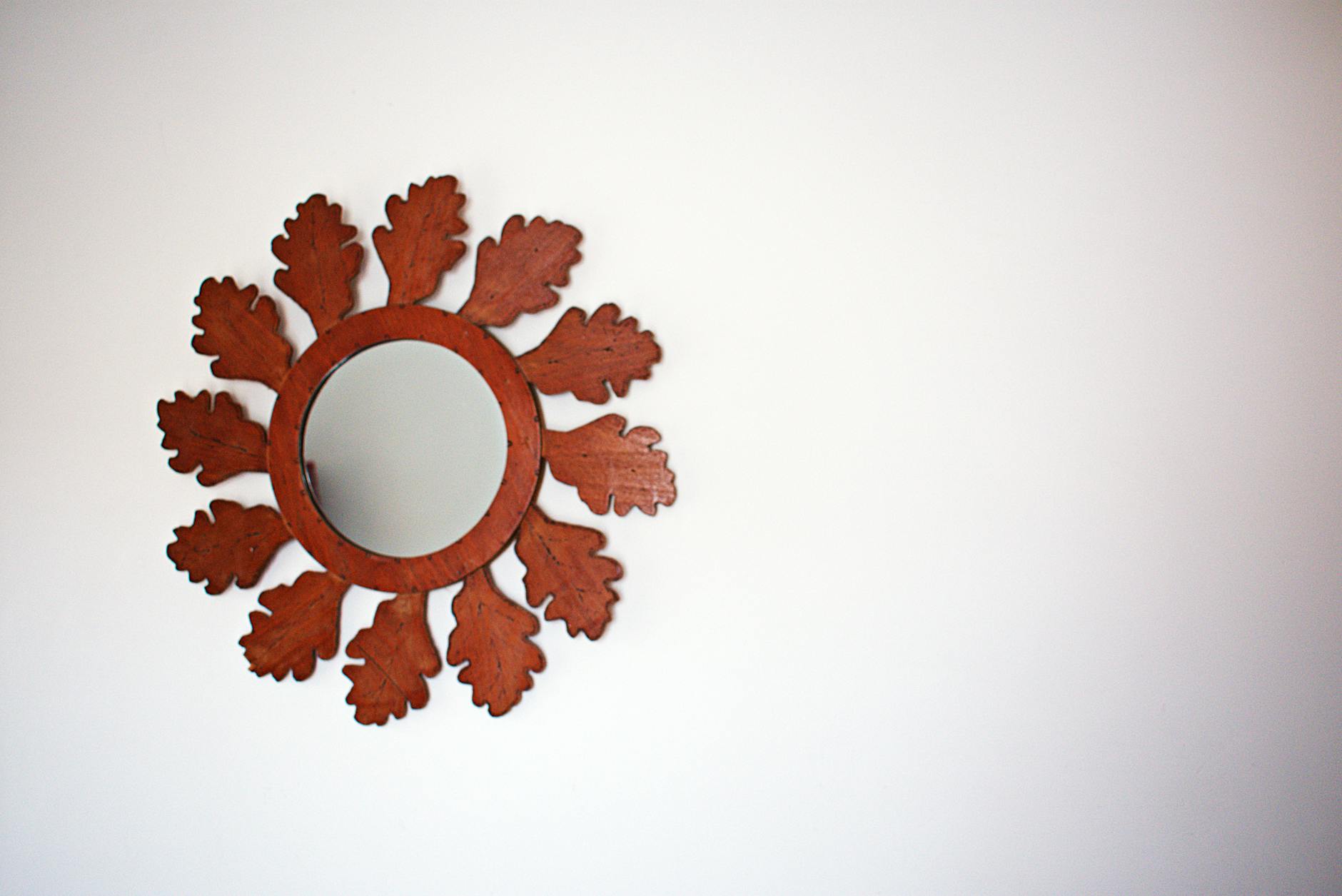 mirror with brown wooden frame